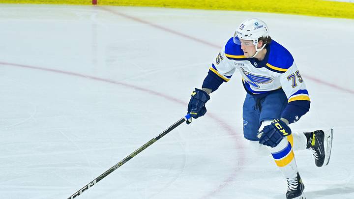 Mar 7, 2023; Tempe, Arizona, USA;  St. Louis Blues defenseman Tyler Tucker (75) carries the puck in the first period against the Arizona Coyotes at Mullett Arena. Mandatory Credit: Matt Kartozian-USA TODAY Sports