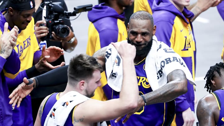 Apr 9, 2025; Dallas, Texas, USA;  Los Angeles Lakers forward LeBron James (23) celebrates with Los Angeles Lakers guard Luka Doncic (77) during the fourth quarter against the Dallas Mavericks at American Airlines Center. Mandatory Credit: Kevin Jairaj-Imagn Images