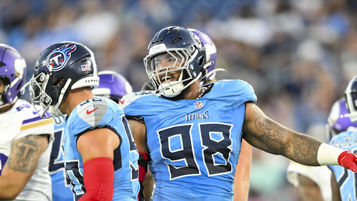 Aug 22, 2025; Nashville, Tennessee, USA;  Tennessee Titans defensive tackle Jeffery Simmons (98) celebrates the tackle for loss against the Minnesota Vikings during the first half at Nissan Stadium. Mandatory Credit: Steve Roberts-Imagn Images