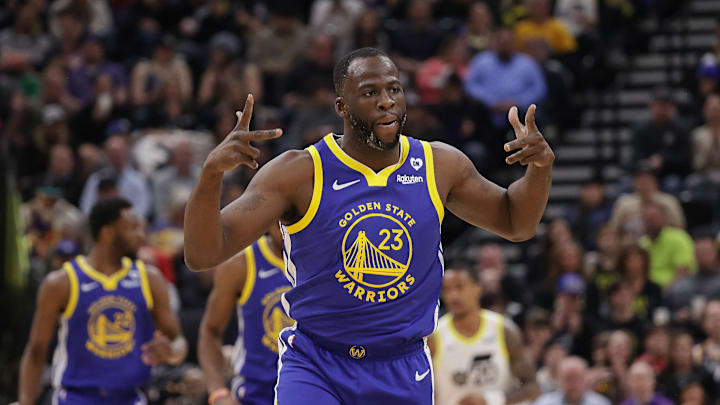 Feb 15, 2024; Salt Lake City, Utah, USA; Golden State Warriors forward Draymond Green (23) celebrates scoring a three point basket during the first quarter against the Utah Jazz at Delta Center. Mandatory Credit: Chris Nicoll-Imagn Images