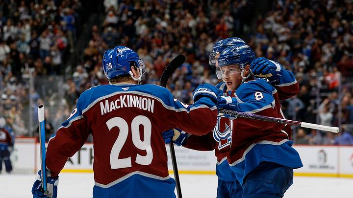 Nov 20, 2025; Denver, Colorado, USA; Colorado Avalanche defenseman Cale Makar (8) celebrates his goal with center Martin Necas (88) and center Nathan MacKinnon (29) in the second period against the New York Rangers at Ball Arena. Mandatory Credit: Isaiah J. Downing-Imagn Images