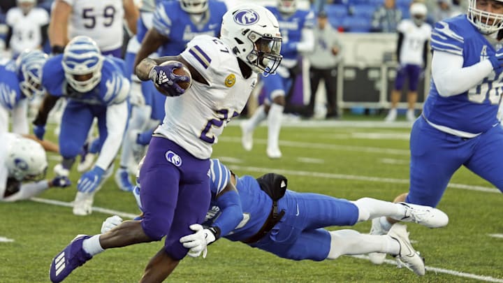 Nov 19, 2022; Memphis, Tennessee, USA; North Alabama Lions running back ShunDerrick Powell (27) runs the ball during the second half against the Memphis Tigers at Simmons Bank Liberty Stadium. Mandatory Credit: Petre Thomas-Imagn Images