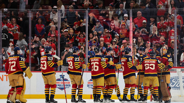 Jan 4, 2026; Sunrise, Florida, USA; Florida Panthers players celebrate with goaltender Daniil Tarasov (40) after the game against the Colorado Avalanche at Amerant Bank Arena. Mandatory Credit: Sam Navarro-Imagn Images