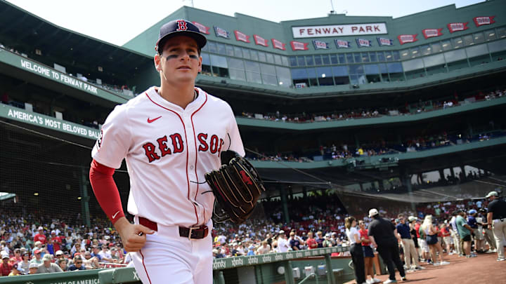 Aug 17, 2025; Boston, Massachusetts, USA; Boston Red Sox left fielder Roman Anthony (19) runs onto the field for warmups prior to a game against the Miami Marlins at Fenway Park. Mandatory Credit: Bob DeChiara-Imagn Images