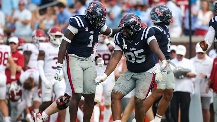 Oct 26, 2024; Oxford, Mississippi, USA; Mississippi Rebels defensive lineman Princely Umanmielen (1) and defensive lineman Akelo Stone (95) reacts after a sack during the second half against the Oklahoma Sooners at Vaught-Hemingway Stadium. Mandatory Credit: Petre Thomas-Imagn Images Oct 26, 2024; Oxford, Mississippi, USA; Mississippi Rebels defensive lineman Princely Umanmielen (1) and defensive lineman Akelo Stone (95) reacts after a sack during the second half against the Oklahoma Sooners at Vaught-Hemingway Stadium. Mandatory Credit: Petre Thomas-Imagn Images