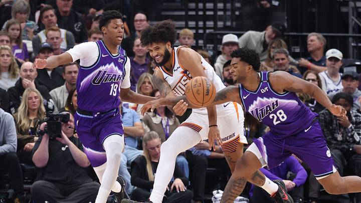 Oct 27, 2025; Salt Lake City, Utah, USA; Phoenix Suns forward Isaiah Livers (18) passes the ball as Utah Jazz guard Ace Bailey (19) and forward Brice Sensabaugh (28) defend during the second half at Delta Center. Mandatory Credit: Rob Gray-Imagn Images
