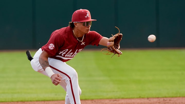Feb 14, 2025; Tuscaloosa, AL, USA; Shortstop Justin Lebron takes a throw at second during Alabama baseball’s opening day at Sewell-Thomas Stadium against Bradley. The Crimson Tide defeated Bradley 10-6.