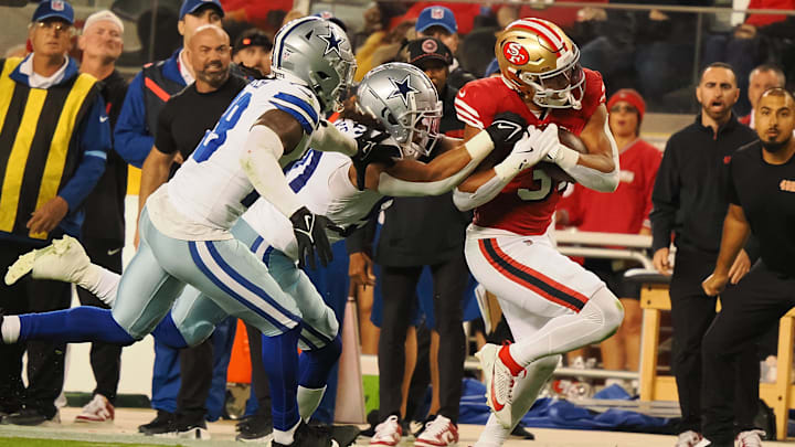 Oct 27, 2024; Santa Clara, California, USA; San Francisco 49ers running back Isaac Guerendo (31) carries the ball against the Dallas Cowboys during the second quarter at Levi's Stadium. Mandatory Credit: Kelley L Cox-Imagn Images