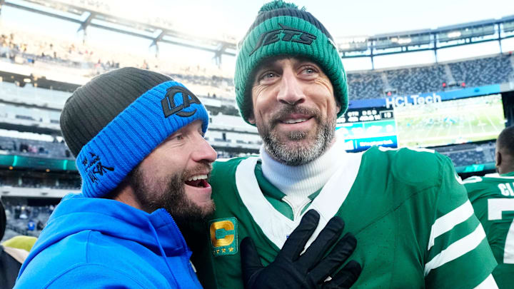 Los Angles Rams coach Sean McVay talks with New York Jets quarterback Aaron Rodgers after a game.