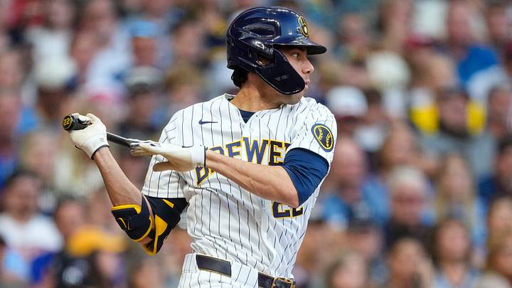 Aug 8, 2026; Milwaukee, Wisconsin, USA;  Milwaukee Brewers designated hitter Christian Yelich (22) singles during the fourth inning against the Minnesota Twins at American Family Field. Mandatory Credit: Jeff Hanisch-Imagn Images
