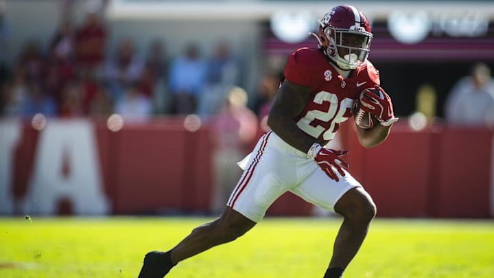 Nov 16, 2024; Tuscaloosa, Alabama, USA; Alabama Crimson Tide running back Jam Miller (26) runs the ball against the Mercer Bears during the first quarter at Bryant-Denny Stadium. Mandatory Credit: Will McLelland-Imagn Images Nov 16, 2024; Tuscaloosa, Alabama, USA; Alabama Crimson Tide running back Jam Miller (26) runs the ball against the Mercer Bears during the first quarter at Bryant-Denny Stadium. Mandatory Credit: Will McLelland-Imagn Images