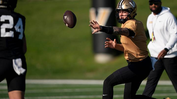 Vanderbilt quarterback Jared Curtis (2) pitches to running back Gabe Fields (24) during drills at Vanderbilt University’s McGugin Center practice fields Tuesday, April 7, 2026. Vanderbilt quarterback Jared Curtis (2) pitches to running back Gabe Fields (24) during drills at Vanderbilt University’s McGugin Center practice fields Tuesday, April 7, 2026.