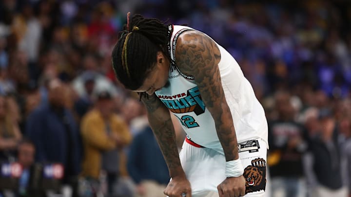 Apr 24, 2025; Memphis, Tennessee, USA; Memphis Grizzlies guard Ja Morant (12) waits to shoot a free throw during the second quarter against the Oklahoma City Thunder during game three for the first round of the 2024 NBA Playoffs at FedExForum. Mandatory Credit: Petre Thomas-Imagn Images Apr 24, 2025; Memphis, Tennessee, USA; Memphis Grizzlies guard Ja Morant (12) waits to shoot a free throw during the second quarter against the Oklahoma City Thunder during game three for the first round of the 2024 NBA Playoffs at FedExForum. Mandatory Credit: Petre Thomas-Imagn Images