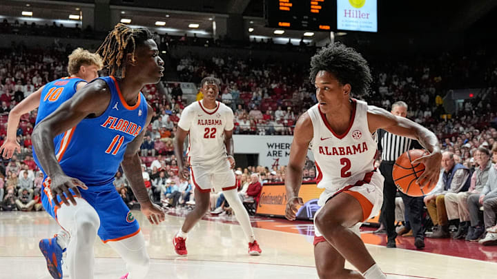 Mar 5, 2025; Tuscaloosa, AL, USA; Alabama guard Aden Holloway (2) tries to drive the ball against Florida guard Denzel Aberdeen (11) at Coleman Coliseum. Mandatory Credit: Gary Cosby Jr.-Tuscaloosa News Mar 5, 2025; Tuscaloosa, AL, USA; Alabama guard Aden Holloway (2) tries to drive the ball against Florida guard Denzel Aberdeen (11) at Coleman Coliseum. Mandatory Credit: Gary Cosby Jr.-Tuscaloosa News