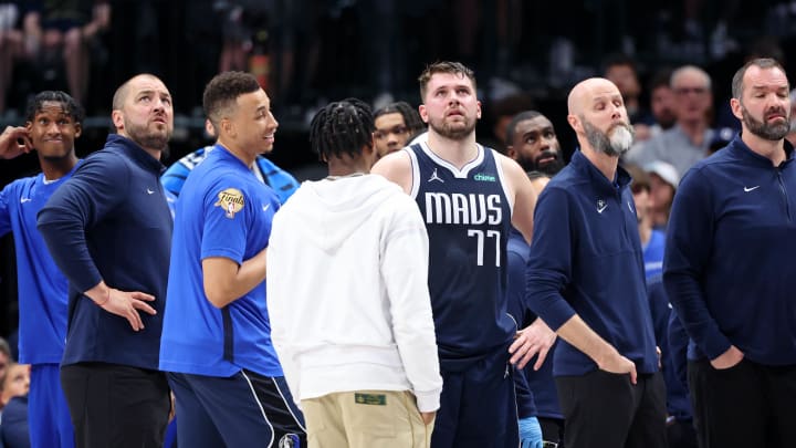 Jun 12, 2024; Dallas, Texas, USA; Dallas Mavericks guard Luka Doncic (77) awaits the result of a challenge before fouling out of the game against the Boston Celtics during the fourth quarter during game three of the 2024 NBA Finals at American Airlines Center. Mandatory Credit: Kevin Jairaj-USA TODAY Sports