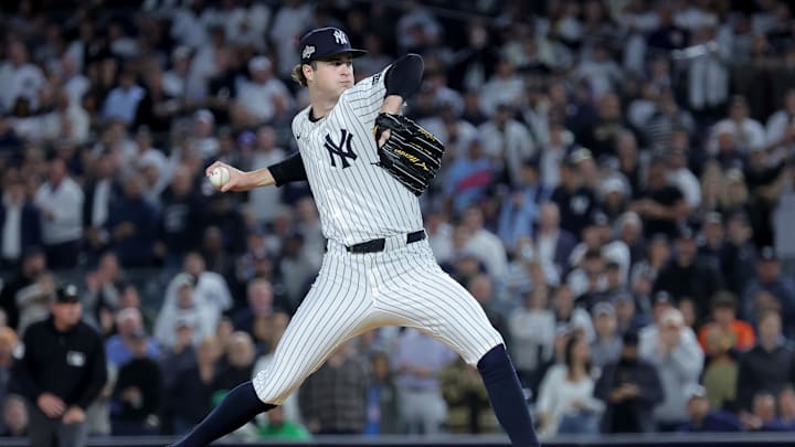 Oct 8, 2025; Bronx, New York, USA; New York Yankees starting pitcher Cam Schlittler (31) pitches against the Toronto Blue Jays during the first inning of game four of the ALDS round of the 2025 MLB playoffs at Yankee Stadium. Mandatory Credit: Brad Penner-Imagn Images