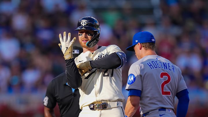 Jul 8, 2025; Minneapolis, Minnesota, USA;  Minnesota Twins designated hitter Ryan Jeffers (27) celebrates his double against the Chicago Cubs in the first inning at Target Field. Mandatory Credit: Brad Rempel-Imagn Images