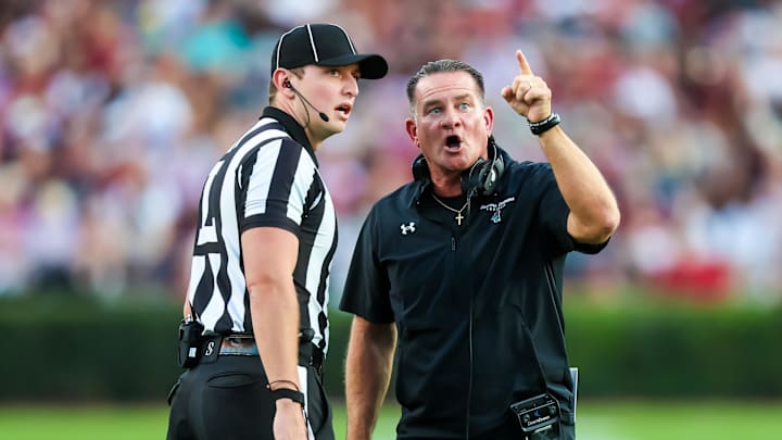 Nov 22, 2025; Columbia, South Carolina, USA; Coastal Carolina Chanticleers head coach Tim Beck disputes a call against the South Carolina Gamecocks in the first quarter at Williams-Brice Stadium. Mandatory Credit: Jeff Blake-Imagn Images