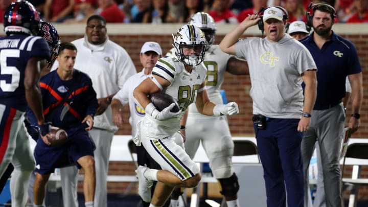 Sep 16, 2023; Oxford, Mississippi, USA; Georgia Tech Yellow Jackets tight end Brett Seither (80) runs after a catch during the first half against the Mississippi Rebels at Vaught-Hemingway Stadium. Mandatory Credit: Petre Thomas-USA TODAY Sports Sep 16, 2023; Oxford, Mississippi, USA; Georgia Tech Yellow Jackets tight end Brett Seither (80) runs after a catch during the first half against the Mississippi Rebels at Vaught-Hemingway Stadium. Mandatory Credit: Petre Thomas-USA TODAY Sports