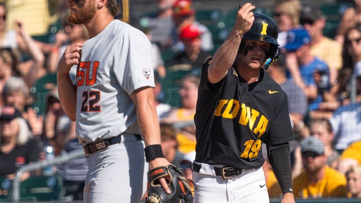 Iowa's Ben Wilmes reacts after getting to first base during game 2 of Iowa vs. Oregon State baseball at Principal Park on May 10, 2025, in Des Moines.