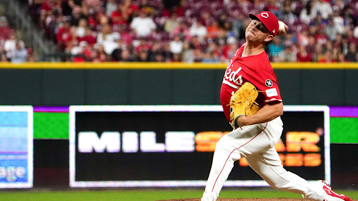 Sep 6, 2025; Cincinnati, Ohio, USA; Cincinnati Reds pitcher Emilio Pagan (15) delivers a pitch in the ninth inning of a MLB game between the Cincinnati Reds and New York Mets, Saturday, Sept. 6, 2025, at Great American Ball Park in downtown Cincinnati. Reds won 6-3. Mandatory Credit: Frank Bowen IV-USA TODAY Network via Imagn Images
