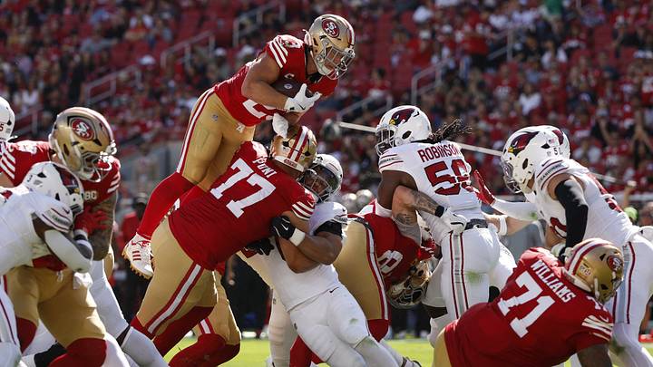 Sep 27, 2026; Santa Clara, California, USA; San Francisco 49ers running back Christian McCaffrey (23) leaps against the Arizona Cardinals in the second half at Levi's Stadium. Mandatory Credit: Sergio Estrada-Imagn Images Sep 27, 2026; Santa Clara, California, USA; San Francisco 49ers running back Christian McCaffrey (23) leaps against the Arizona Cardinals in the second half at Levi's Stadium. Mandatory Credit: Sergio Estrada-Imagn Images