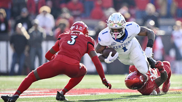 Nov 25, 2023; Louisville, Kentucky, USA;  Kentucky Wildcats running back Ray Davis (1) dives for