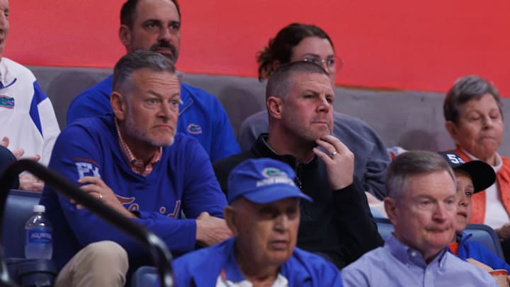 Mar 8, 2025; Gainesville, Florida, USA; Florida Gators athletic director Scott Stricklin and head football coach Billy Napier watch the second half against the Mississippi Rebels at Exactech Arena at the Stephen C. O'Connell Center. Mandatory Credit: Matt Pendleton-Imagn Images