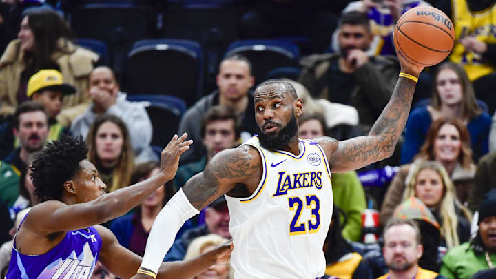 Dec 1, 2024; Salt Lake City, Utah, USA; Utah Jazz guard Collin Sexton (2) defends Los Angeles Lakers forward LeBron James (23) during the first half at the Delta Center. Mandatory Credit: Christopher Creveling-Imagn Images