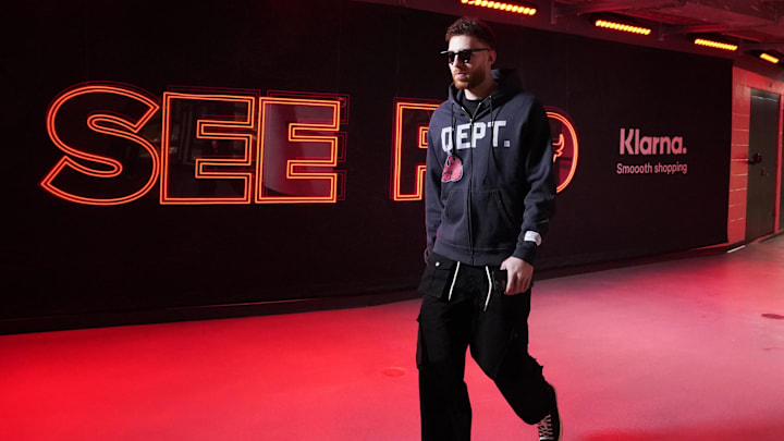 Chicago Bulls forward Onuralp Bitim (17) enters the building before the game against the New York Knicks at United Center.