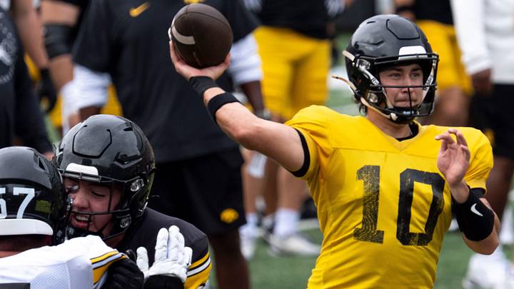 Iowa quarterback Jeremy Hecklinski (10) throws a pass Aug. 15, 2026 during the Kids Day at Kinnick open practice at Kinnick Stadium in Iowa City, Iowa. Iowa quarterback Jeremy Hecklinski (10) throws a pass Aug. 15, 2026 during the Kids Day at Kinnick open practice at Kinnick Stadium in Iowa City, Iowa.