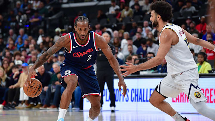 Apr 24, 2025; Inglewood, California, USA; Los Angeles Clippers forward Kawhi Leonard (2) moves the ball against Denver Nuggets guard Jamal Murray (27) during the second half of game three in the first round for the 2024 NBA Playoffs at Intuit Dome. Mandatory Credit: Gary A. Vasquez-Imagn Images Apr 24, 2025; Inglewood, California, USA; Los Angeles Clippers forward Kawhi Leonard (2) moves the ball against Denver Nuggets guard Jamal Murray (27) during the second half of game three in the first round for the 2024 NBA Playoffs at Intuit Dome. Mandatory Credit: Gary A. Vasquez-Imagn Images