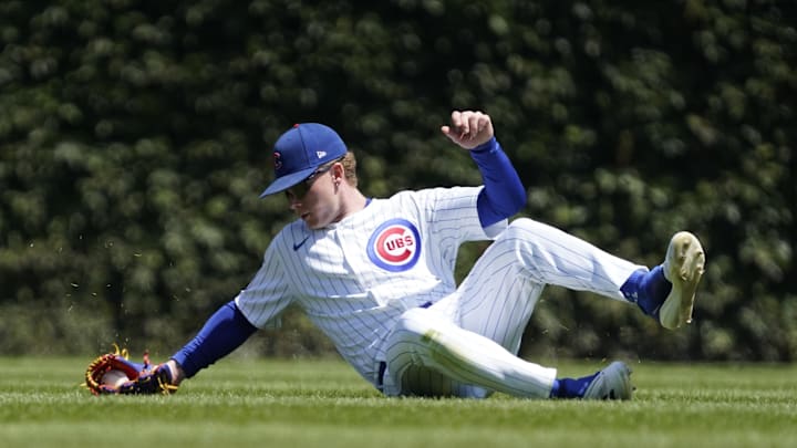 Aug 7, 2024; Chicago, Illinois, USA; Chicago Cubs outfielder Pete Crow-Armstrong (52) makes a catch on a ball hit by Minnesota Twins third baseman Jose Miranda (not pictured) during the first inning at Wrigley Field. Mandatory Credit: David Banks-Imagn Images