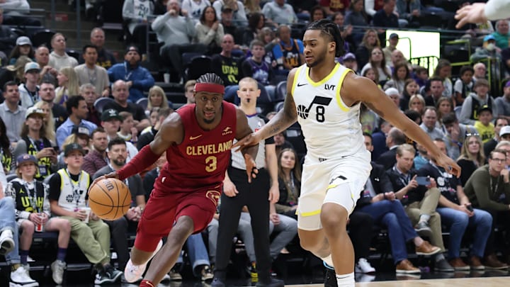 Apr 2, 2024; Salt Lake City, Utah, USA; Cleveland Cavaliers guard Caris LeVert (3) drives to the basket as Utah Jazz forward Brice Sensabaugh (8) defends during the first quarter at Delta Center. Mandatory Credit: Rob Gray-USA TODAY Sports