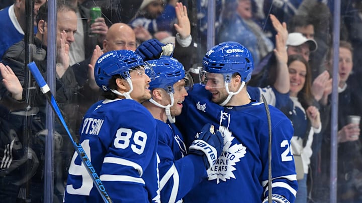 Mar 25, 2025; Toronto, Ontario, CAN;  Toronto Maple Leafs forward Max Domi (11) celebrates with forwards Nick Robertson (89) and Scott Laughton (24) after scoring a goal against the Philadelphia Flyers in the third period at Scotiabank Arena. Mandatory Credit: Dan Hamilton-Imagn Images