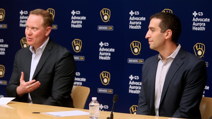 Matt Arnold, left, speaks at press conference where it was announced that he would be taking over the role as president of baseball operations for the Milwaukee Brewers, October 27, 2022. David Stearns, who joined the organization in October 2015 as general manager and was named president of baseball operations prior to the 2019 season, said he would be stepping down.