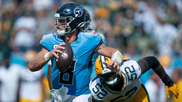 Tennessee Titans quarterback Will Levis (8) is pressured by Green Bay Packers defensive end Rashan Gary (52) during their game at Nissan Stadium in Nashville, Tenn., Sunday, Sept. 22, 2024.
