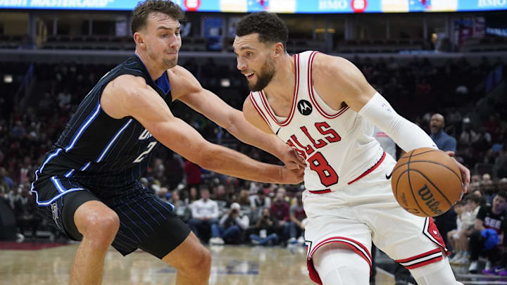 Orlando Magic forward Franz Wagner (22) defends Chicago Bulls guard Zach LaVine (8) during the first quarter at United Center. Mandatory Credit: David Banks-Imagn Images