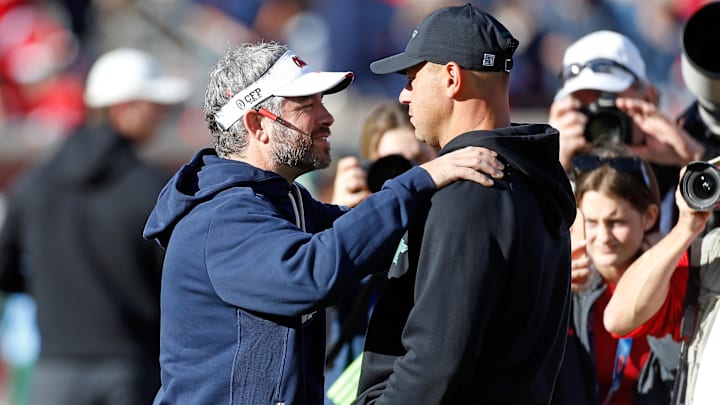 Ole Miss Rebels head coach Pete Golding and Tulane head coach Jon Sumrall embrace prior to the game
