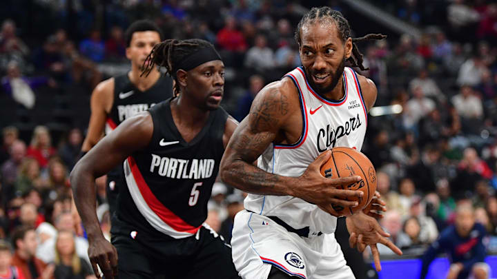 Oct 26, 2025; Inglewood, California, USA; Los Angeles Clippers forward Kawhi Leonard (2) moves the ball against Portland Trail Blazers guard Jrue Holiday (5) during the first half at Intuit Dome. Mandatory Credit: Gary A. Vasquez-Imagn Images Oct 26, 2025; Inglewood, California, USA; Los Angeles Clippers forward Kawhi Leonard (2) moves the ball against Portland Trail Blazers guard Jrue Holiday (5) during the first half at Intuit Dome. Mandatory Credit: Gary A. Vasquez-Imagn Images