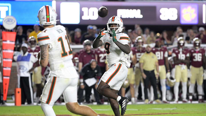 Oct 4, 2025; Tallahassee, Florida, USA; Miami Hurricanes tight end Elija Lofton (9) makes a catch during the second half against the Florida State Seminoles at Doak S. Campbell Stadium. Mandatory Credit: Melina Myers-Imagn Images