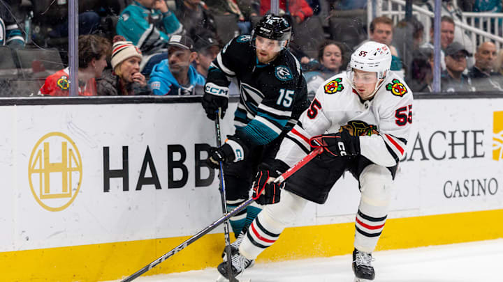 Mar 13, 2025; San Jose, California, USA; Chicago Blackhawks defenseman Artyom Levshunov (55) reaches for the puck during the third period against the San Jose Sharks at SAP Center at San Jose. Mandatory Credit: Bob Kupbens-Imagn Images
