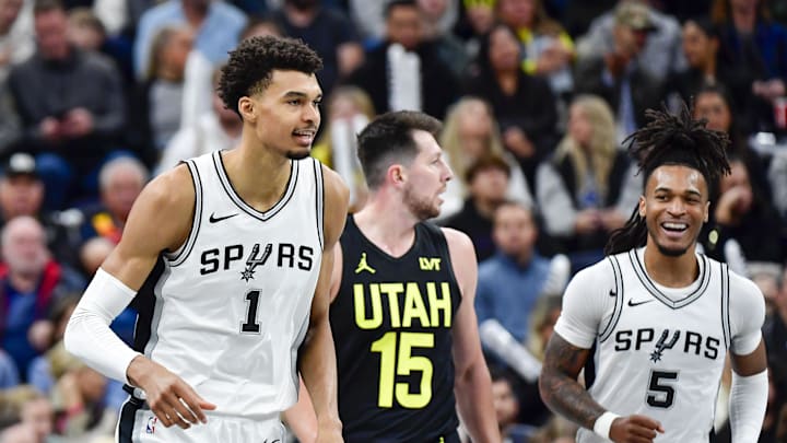 Nov 26, 2024; Salt Lake City, Utah, USA; San Antonio Spurs forward/center Victor Wembanyama (1) reacts along with guard Stephon Castle (5) after a three point basket against the Utah Jazz during the first half at the Delta Center. Mandatory Credit: Christopher Creveling-Imagn Images
