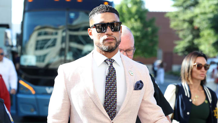 Sep 27, 2025; Fayetteville, Arkansas, USA; Notre Dame Fighting Irish head coach Marcus Freeman arrives prior to the game against the Arkansas Razorbacks at Donald W. Reynolds Razorback Stadium. Mandatory Credit: Nelson Chenault-Imagn Images