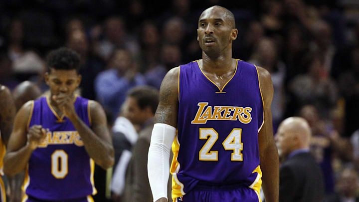 Dec 12, 2014; San Antonio, TX, USA; Los Angeles Lakers shooting guard Kobe Bryant (24) walks up court against the San Antonio Spurs during the second half at AT&T Center. Mandatory Credit: Soobum Im-Imagn Images