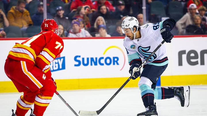 Oct 30, 2026; Calgary, Alberta, CAN; Seattle Kraken center Frederick Gaudreau (89) controls the puck against Calgary Flames defenseman Simon Nemec (71) during the first period at Scotiabank Saddledome. Mandatory Credit: Sergei Belski-Imagn Images Oct 30, 2026; Calgary, Alberta, CAN; Seattle Kraken center Frederick Gaudreau (89) controls the puck against Calgary Flames defenseman Simon Nemec (71) during the first period at Scotiabank Saddledome. Mandatory Credit: Sergei Belski-Imagn Images
