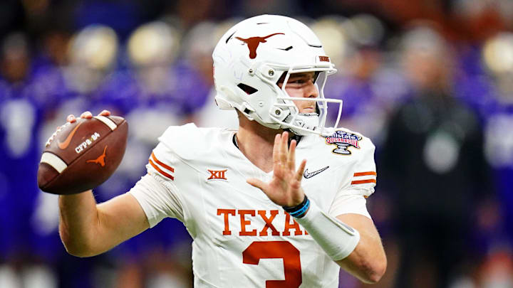 Jan 1, 2024; New Orleans, LA, USA; Texas Longhorns quarterback Quinn Ewers (3) throws a pass during