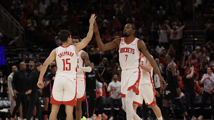 Mar 21, 2026; Houston, Texas, USA; Houston Rockets forward Kevin Durant (7) reacts with guard Reed Sheppard (15) against the Miami Heat  in the second half at Toyota Center. Mandatory Credit: Thomas Shea-Imagn Images