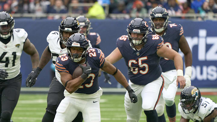 Oct 13, 2024; London, United Kingdom; Chicago Bears running back Roschon Johnson (23) carries the ball during the first half of an NFL International Series game at Tottenham Hotspur Stadium. Mandatory Credit: Peter van den Berg-Imagn Images