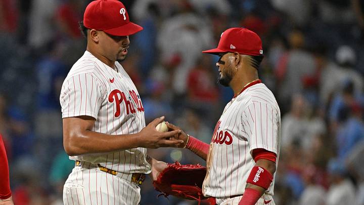 Aug 17, 2026; Philadelphia, Pennsylvania, USA; Philadelphia Phillies pitcher Jhoan Duran (59) and second baseman Luis Arraez (4) celebrate win against the Miami Marlins at Citizens Bank Park. Mandatory Credit: Eric Hartline-Imagn Images